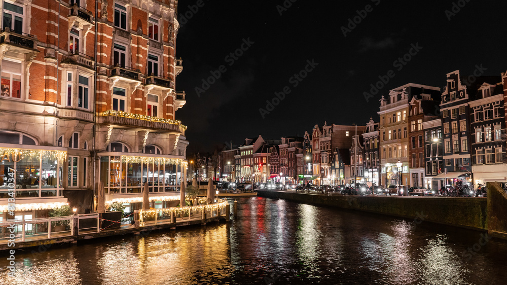 canal in amsterdam at night