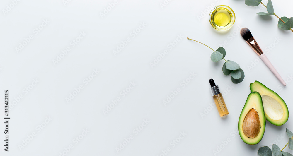 Ingredients for home spa top view: honey, avocado,essential oil Ingredients for home spa top view: honey, avocado,essential oil