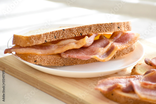 Bacon sandwich with multigrain bread. Selective focus.
