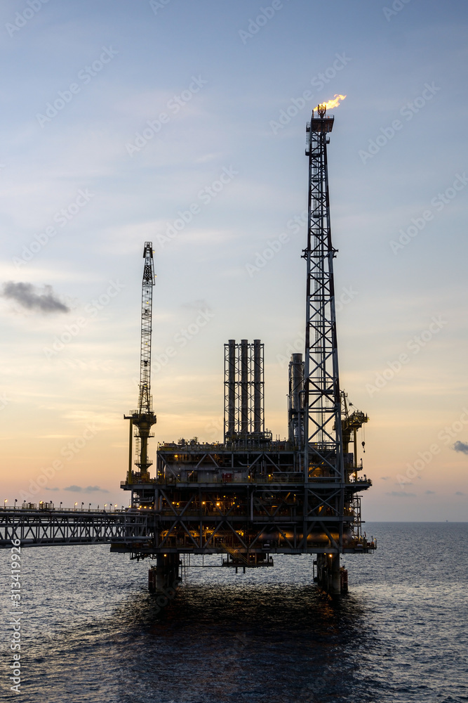 Oil production platform with flare stack in operational at Terengganu oil field