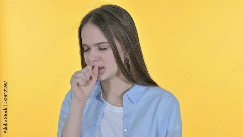 Portrait of Sick Casual Young Woman Coughing, Yellow Background Portrait of Sick Casual Young Woman Coughing, Yellow Background