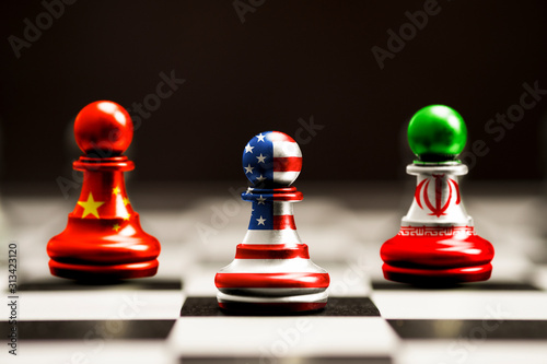 Print screen of flag on pawn chess of USA China and Iran. It is symbol trade and Military war.