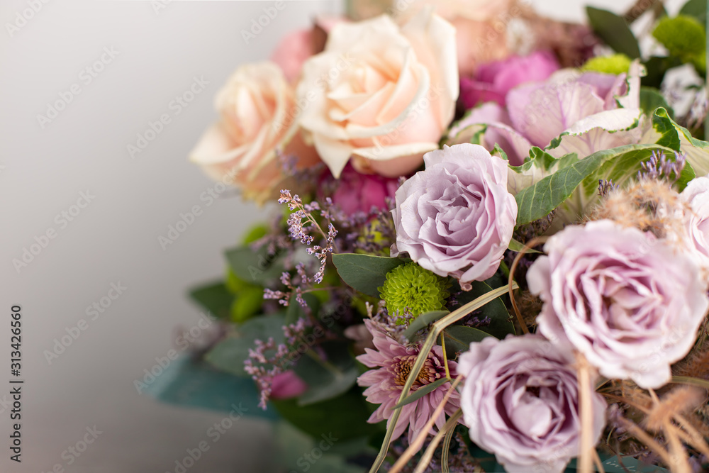 beautiful bouquet of mixed flowers. greeting card. horizontal image, selective focus, blurred background