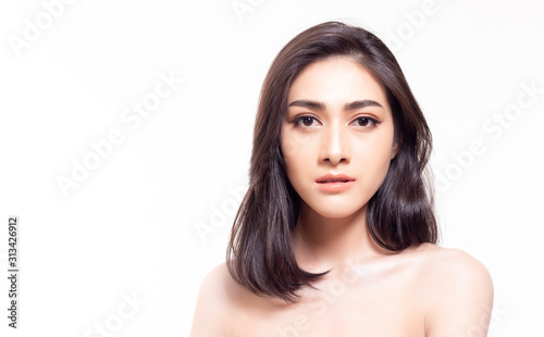 Beauty model asian woman with natural make up and long eyelashes, long hair. Spa and wellness. Youth and skin care concept. Portrait beautiful asian female. studio on white background. copy space