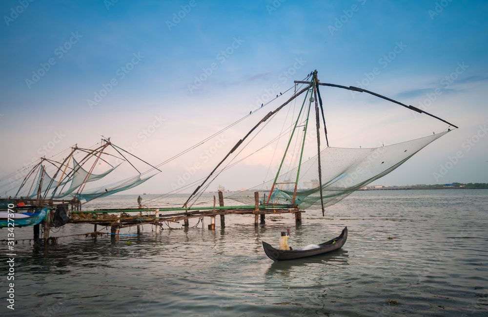 Traditional Chinese fishing nets near fort cochin at sunset, Kerala, India