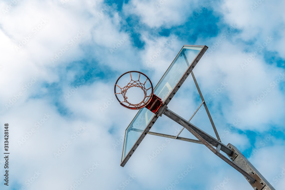 Basketball hoop against sky background Basketball hoop against sky background