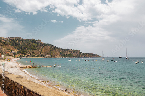 Tropical island and sea with luxury boats