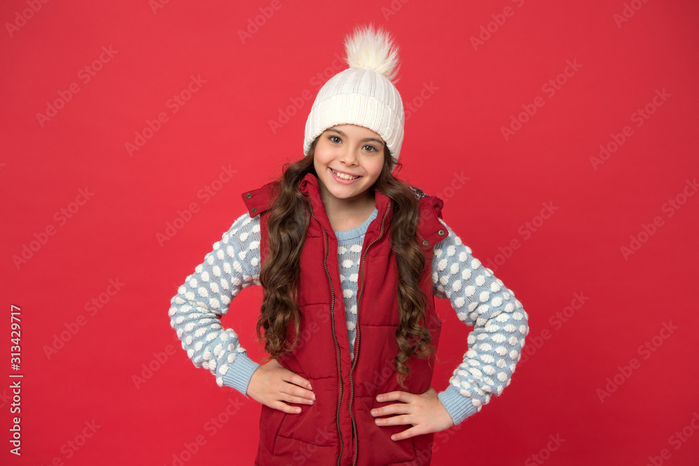Fototapeta premium New clothes. winter fashion for kids. childhood happiness. happy winter holiday and activity. weather forecast. high quality knitwear. feeling warm and happy. cheerful child in cosy knitted outfit