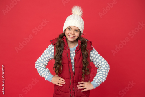 New clothes. winter fashion for kids. childhood happiness. happy winter holiday and activity. weather forecast. high quality knitwear. feeling warm and happy. cheerful child in cosy knitted outfit