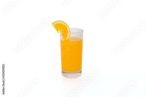 glass of juice and orange isolated on white