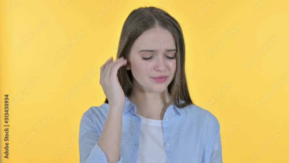 Upset Casual Young Woman Shocked by Results, Yellow Background Upset Casual Young Woman Shocked by Results, Yellow Background