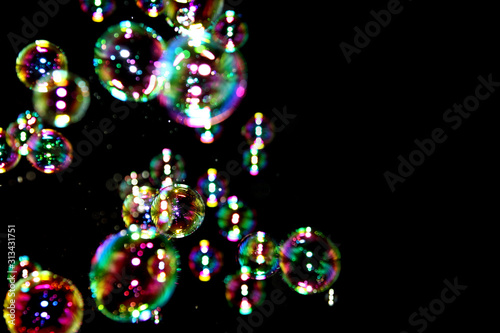 Soap bubbles in black background