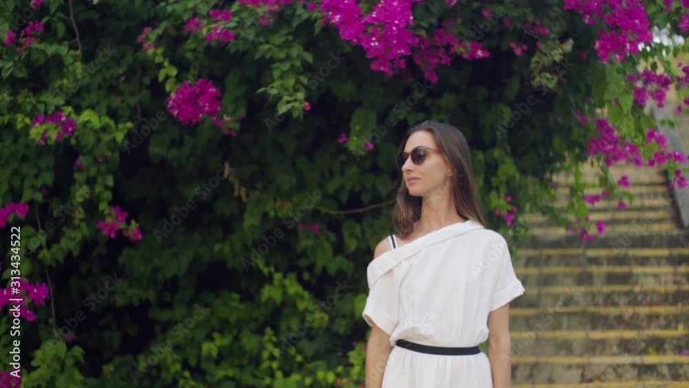Portrait of Elegant Young Woman in Slow-Motion. Portrait of Elegant Young Woman in Slow-Motion.