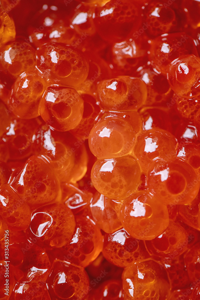 Close up macro of red salmon caviar. Sea food background Close up macro of red salmon caviar. Sea food background