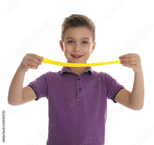 Little boy with slime on white background photo