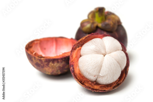 Closeup of purple mangosteen on white background