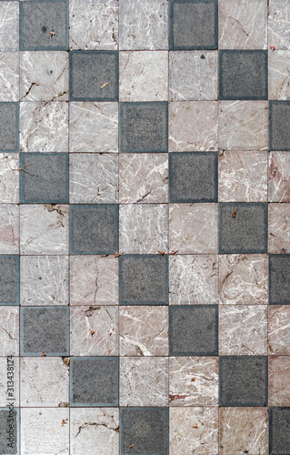 Wide geometric checkered floor with marble tiles
