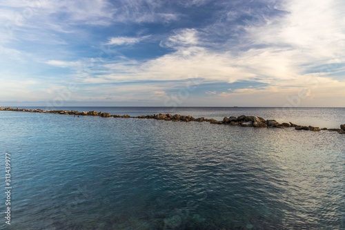 Gorgeous colorful view of sunset on Curacao island. Beautiful nature landscape. Caribbean.