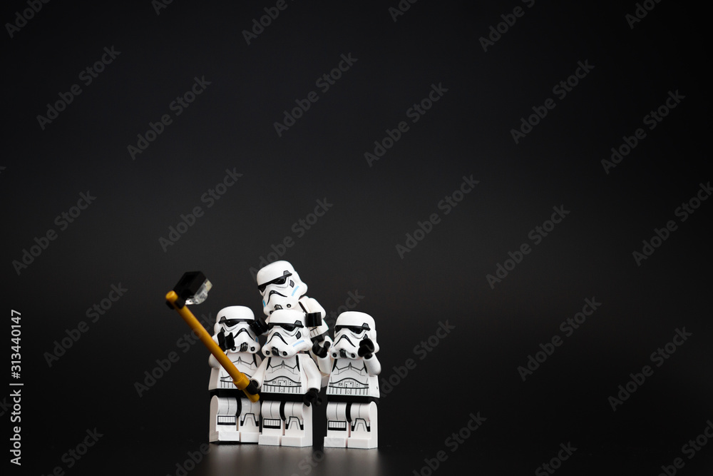 Naklejka premium Orvieto, Italy - November 15th 2015: Star Wars Lego Stormtroopers minifigures take a selfie. Lego is a popular line of construction toys manufactured by the Lego Group