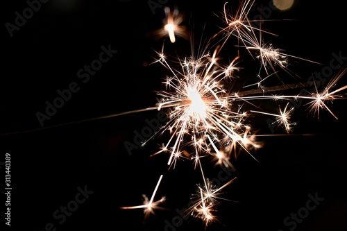 Beautiful abstract shot of sparklers on black background.