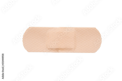 Top view of  beige adhesive bandages isolated on white
