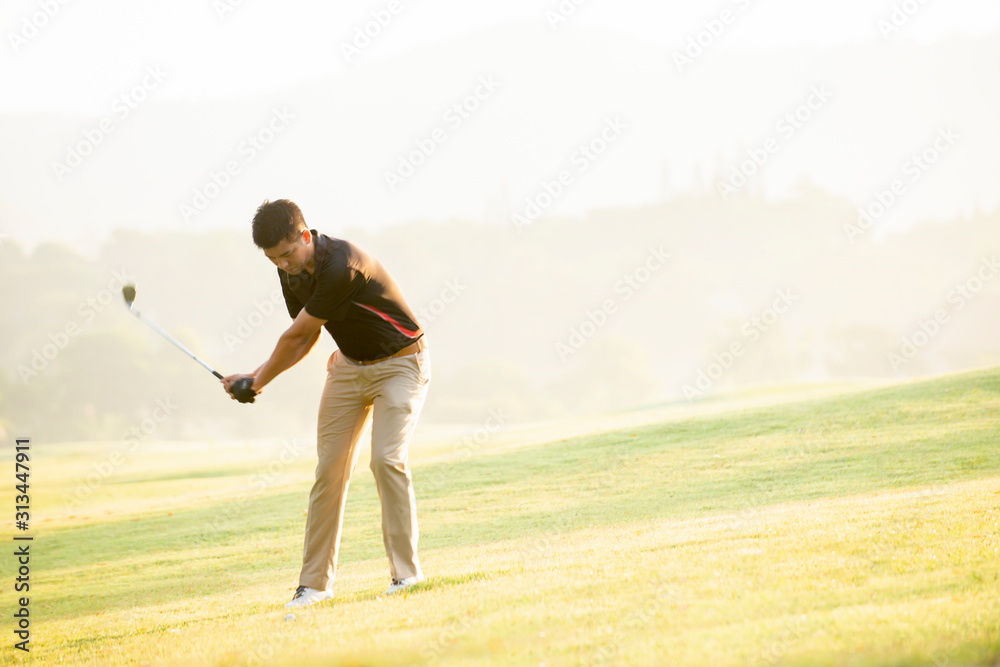 Asian man golfer playing golf at golf course Asian man golfer playing golf at golf course