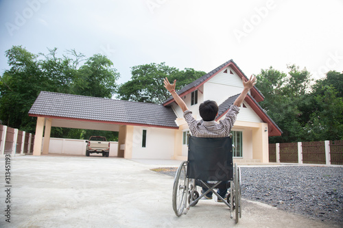 Disabled man is wheelchair at home.Disabled concept photo