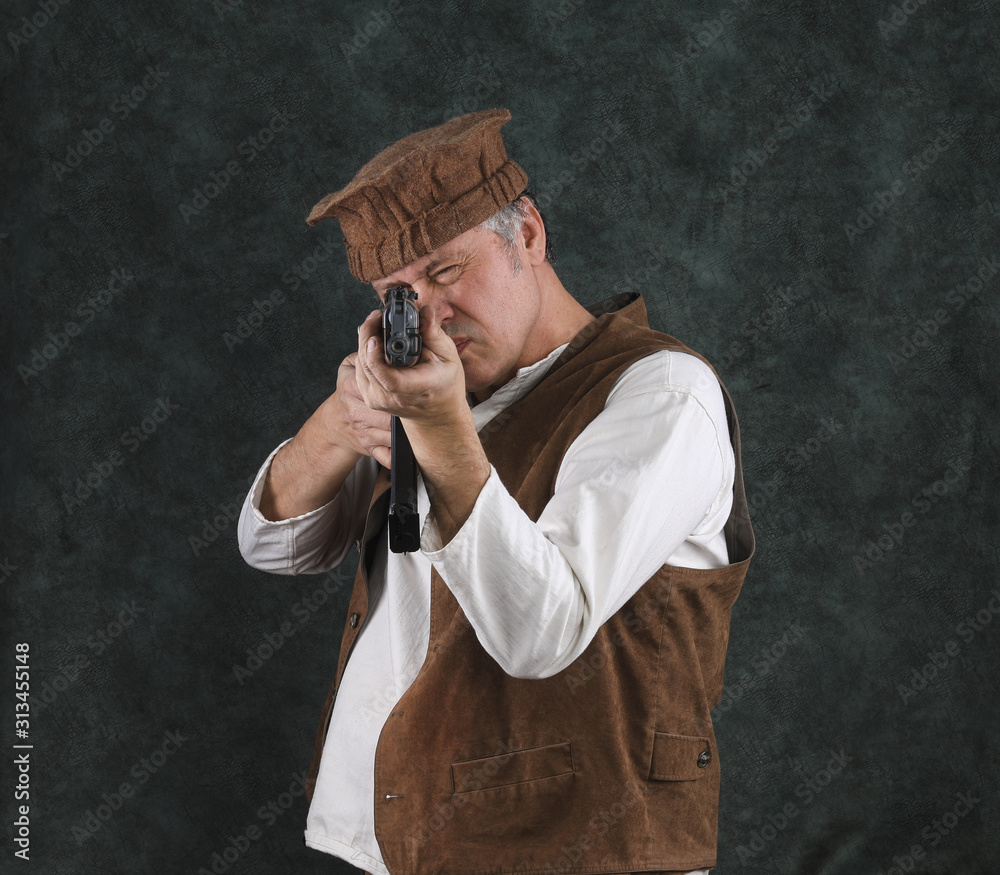 a man with a Kalashnikov assault rifle a man with a Kalashnikov assault rifle