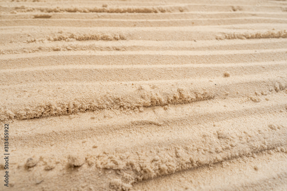 Naklejka premium Textured sand use for background.