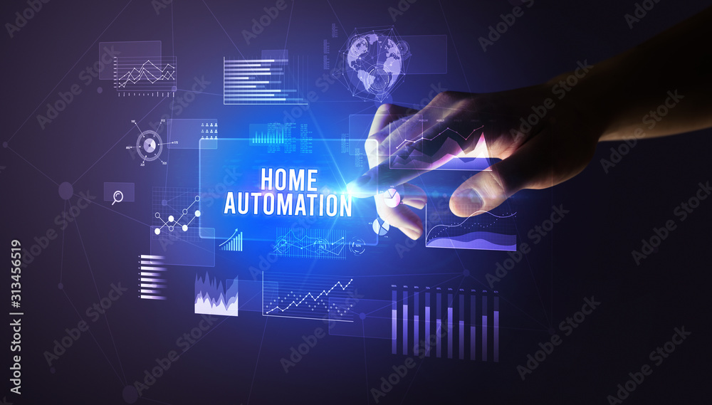 Hand touching HOME AUTOMATION inscription, new business technology concept Hand touching HOME AUTOMATION inscription, new business technology concept