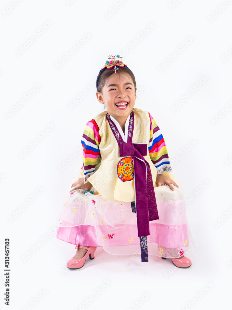 Asian little boy and girl wearing a Korean Traditional Hanbok dress in Rattan bag on white background