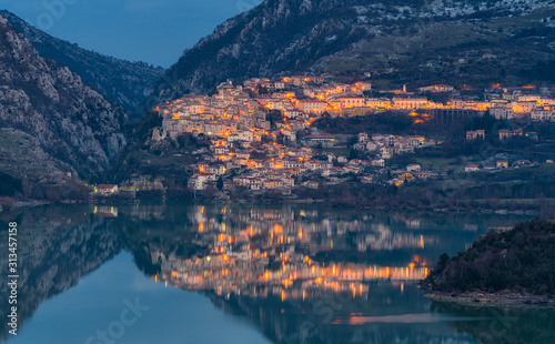 Panoramic evening view of Barrea and its lake, province of L'Aquila in the Abruzzo region of Italy.