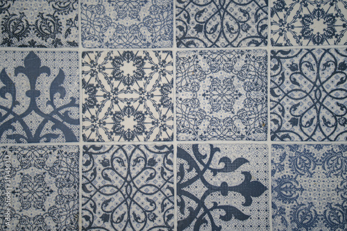 Blue textured tile background.