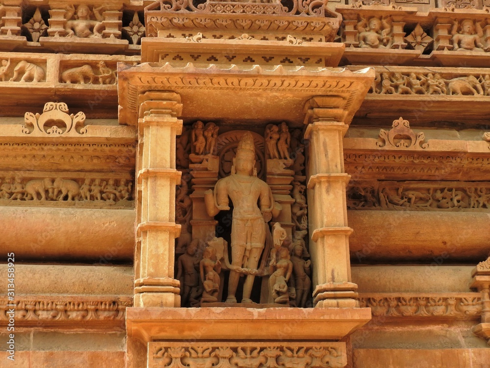 Erotic sculptures and sex poses of man in kajuraho temples, Madhya Pradesh, India. Built around 1050, it is a UNESCO world heritage site, a tourist destination. The concept of textures and postcards.