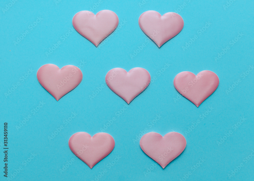 Valentine's Day background. A pink  heart  on blue background, flat lay minimal concept, trendy pop art style photo. Valentines day concept. Flat lay, top view, copy space