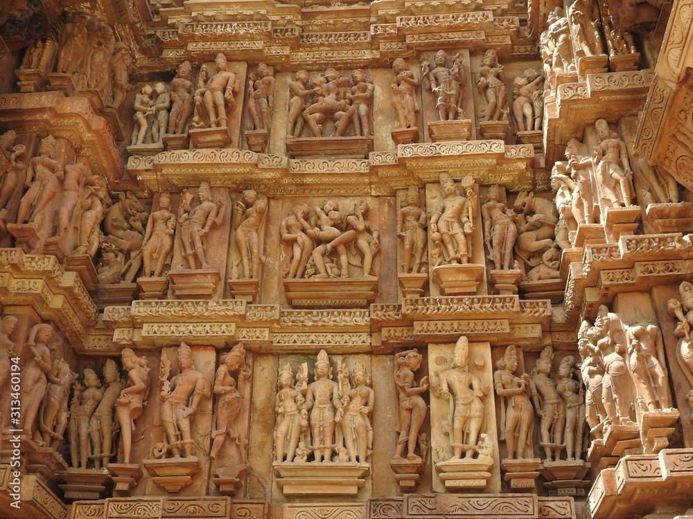 Erotic Human Sculptures at Vishvanatha Temple, Western temples of Khajuraho, Madhya Pradesh, India. Built around 1050, Khajuraho is UNESCO World heritage site and is tourist destination for erotica.