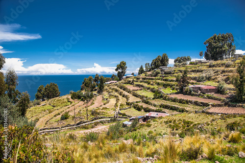 Village on Taquile island in Titicaca lake, Peru photo