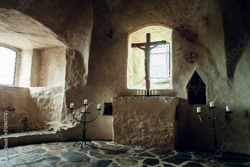 Dark medieval protestant stone monastic cell. Olavinlinna castle, Savonlinna, Finland.