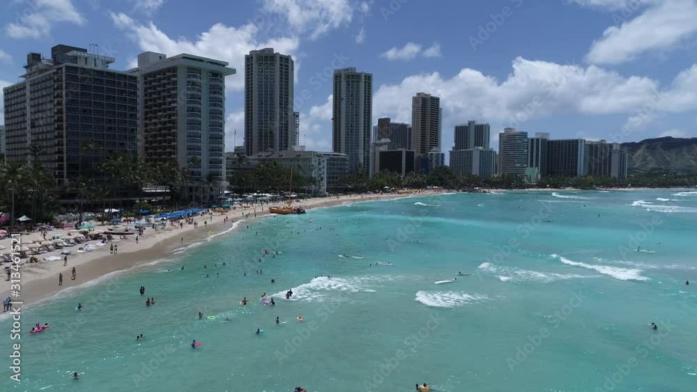 Aerial view of Waikiki beach, Oahu Hawaii. Swimmers, surfers and sunbathing on the beach. Aerial view of Waikiki beach, Oahu Hawaii. Swimmers, surfers and sunbathing on the beach.