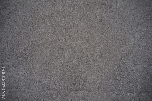 Grey plaster wall background.