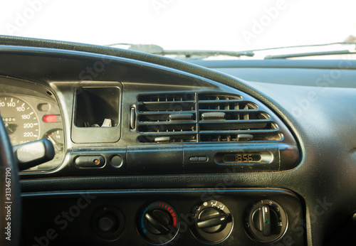 interior dashboard of old 90s car © Ioan Panaite