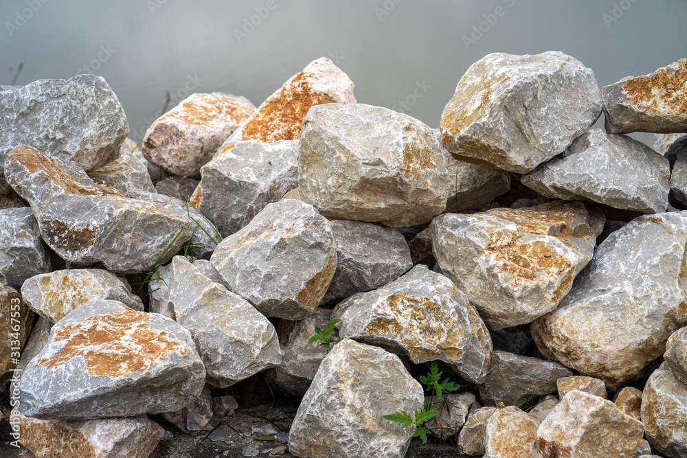 piled rocks in garden use for background. piled rocks in garden use for background.