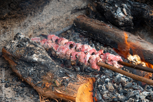 In Madeira the typical espetada is beef in a bay laurel skewer, seasond with salt, pepper, garlic and bay leafs. It is then cooked over hot charcoal or a log fire.