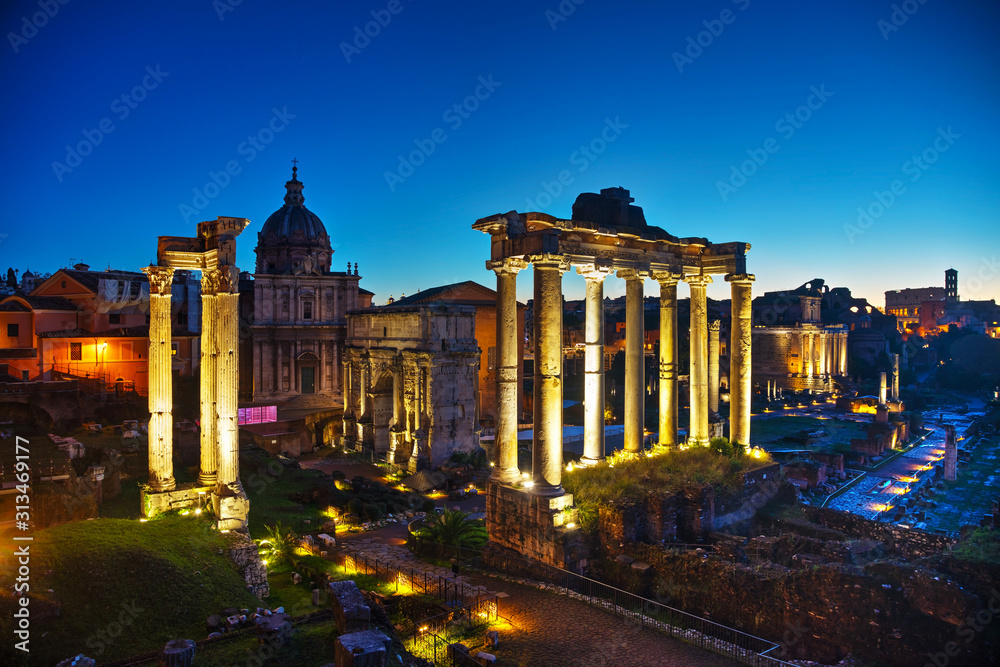 Roman forum ruins at the night time