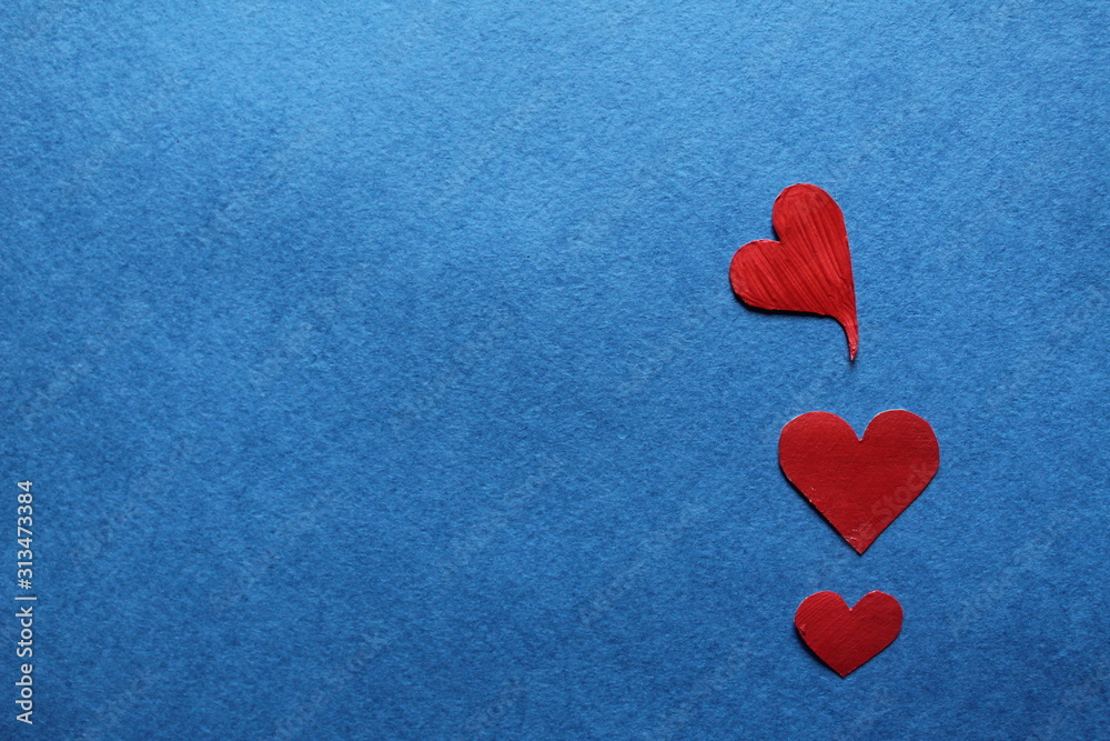 red heart or red hearts on a blue background red heart or red hearts on a blue background