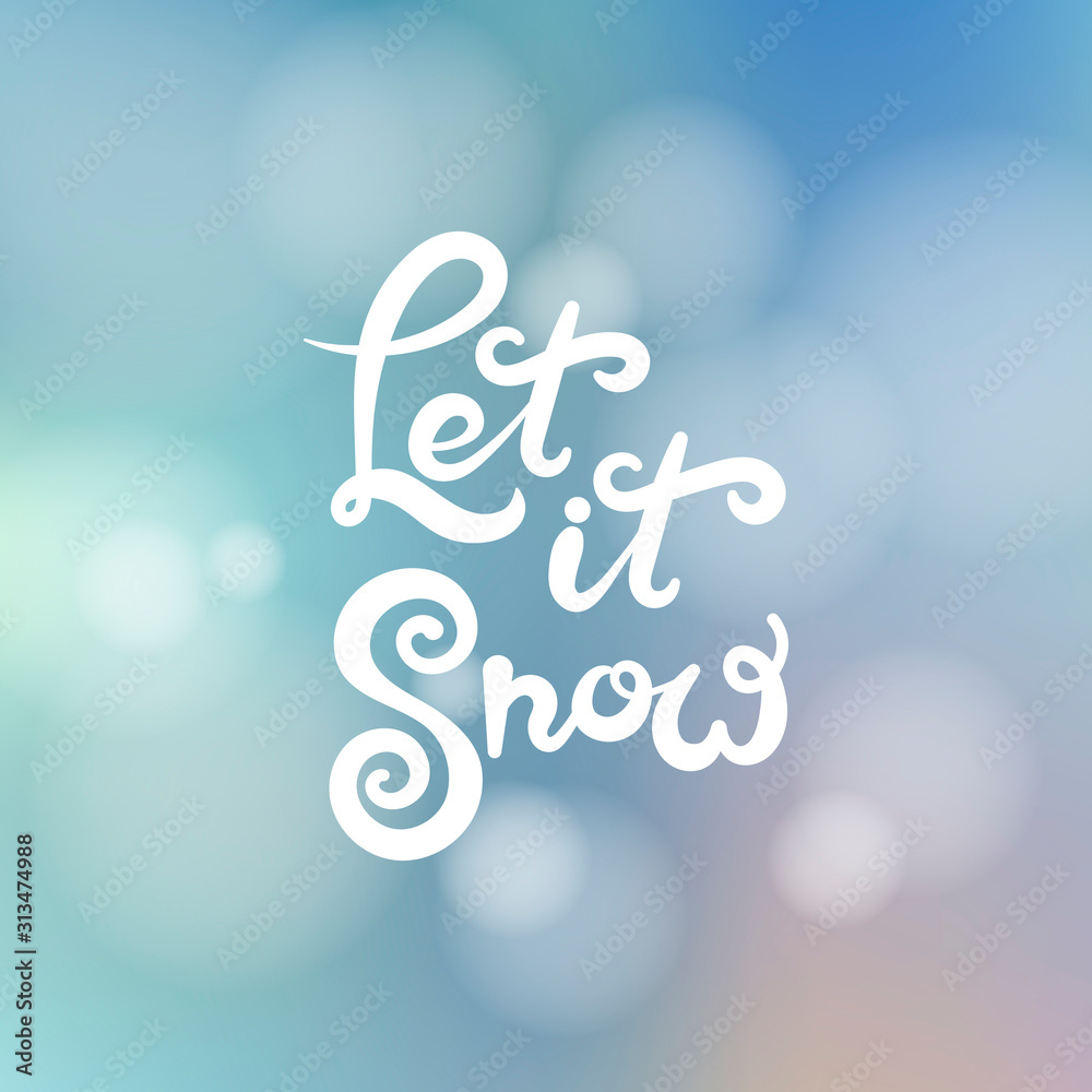 Let it snow text calligraphy. Brush lettering at blurred winter background.