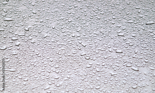 Obraz na płótnie Waterdrops on grey surface. w salonie