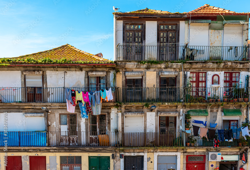 Colorful Houses in the city of Porto Portugal with laundry outside