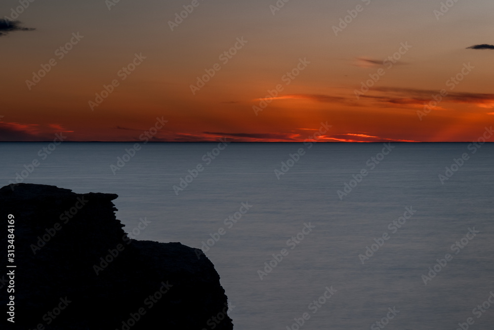 Sunset. Byrum raukar on Swedish Island Oland: Spectacular limestone formations