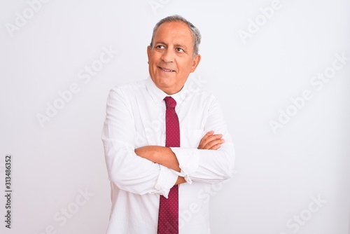 Senior grey-haired businessman wearing elegant tie over isolated white background smiling looking to the side and staring away thinking.